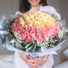 99 champagne and pink roses