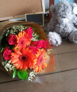 hand bouquet orange gerbera red roses